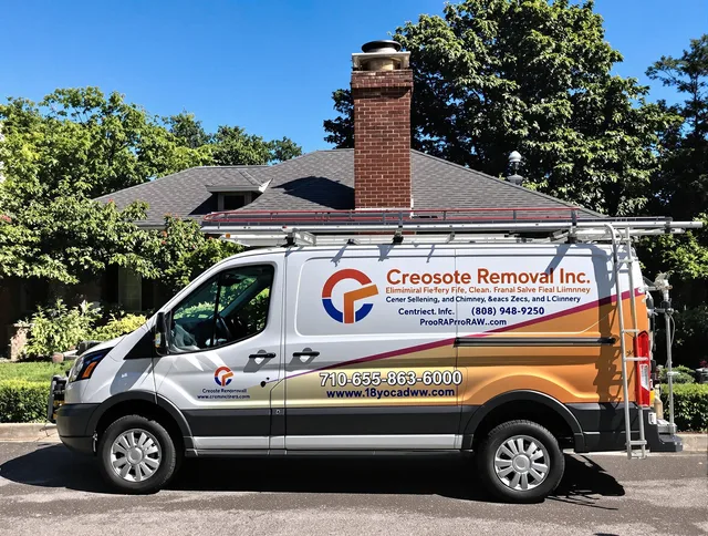 Brecksville Chimney Sweep technician removing creosote safely in Brecksville, OH